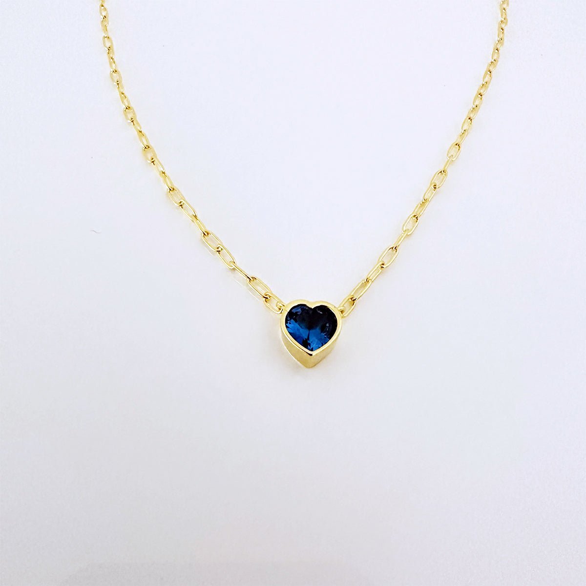 Blue Topaz Heart Necklace: Silver & Gold Plated Elegance